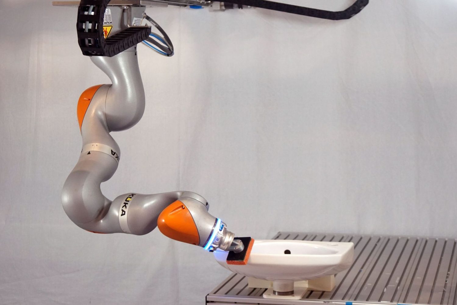 Crazy video shows a robot learning how to do a job just by watching a person