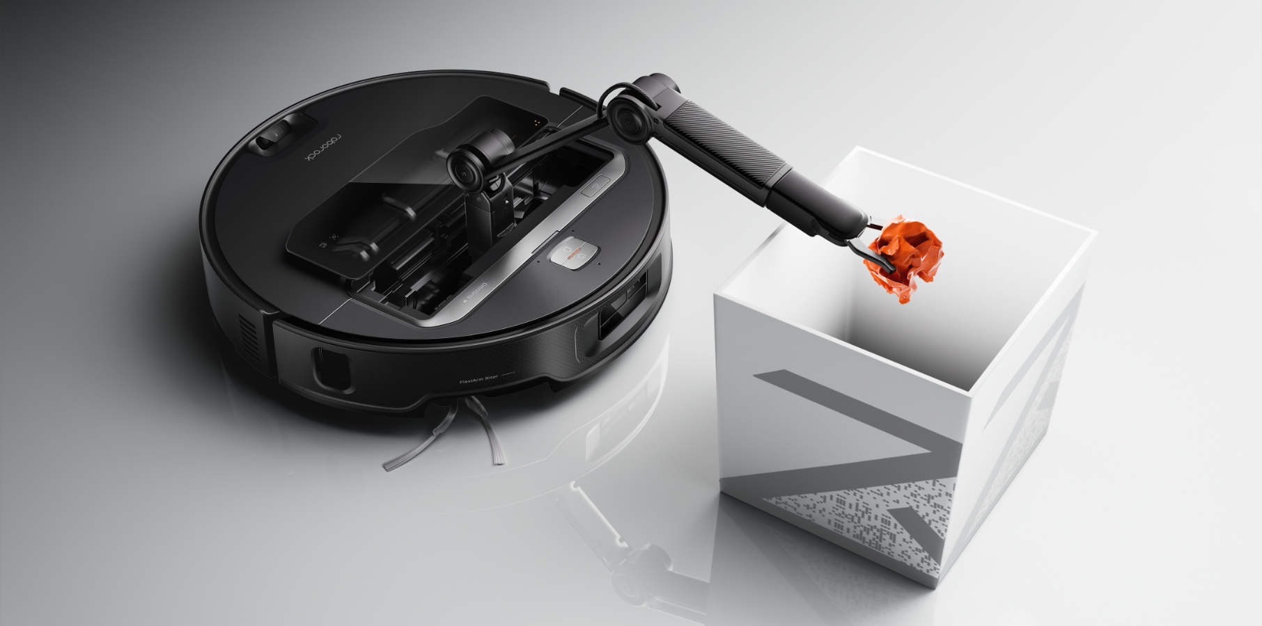 CES 2025: Roborock announced a robot vacuum with an arm to pick your dirty socks